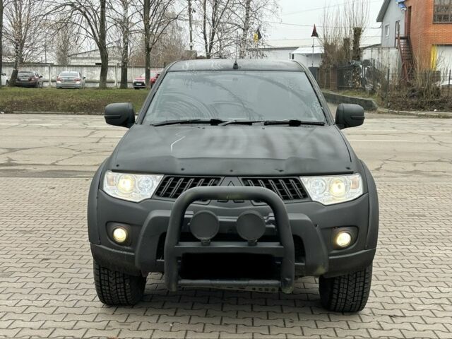 Чорний Міцубісі Л 200, об'ємом двигуна 2.5 л та пробігом 128 тис. км за 5650 $, фото 7 на Automoto.ua