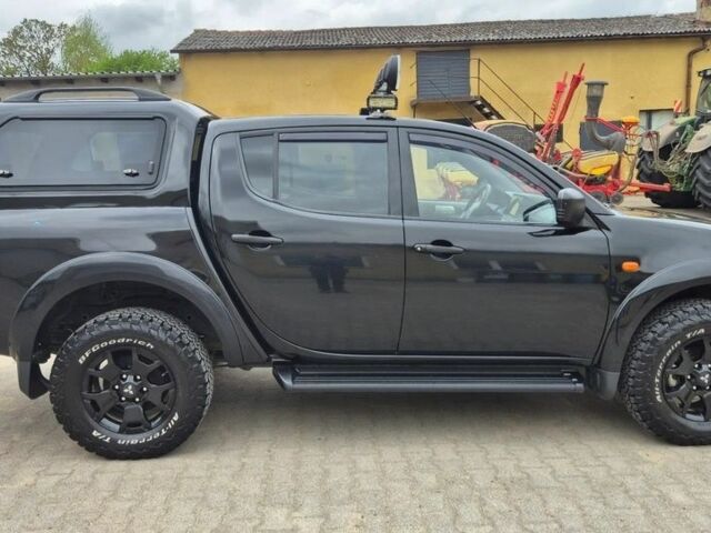 Чорний Міцубісі Л 200, об'ємом двигуна 2.5 л та пробігом 218 тис. км за 4974 $, фото 2 на Automoto.ua