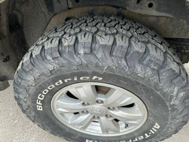 Чорний Міцубісі Л 200, об'ємом двигуна 2.5 л та пробігом 134 тис. км за 16300 $, фото 1 на Automoto.ua