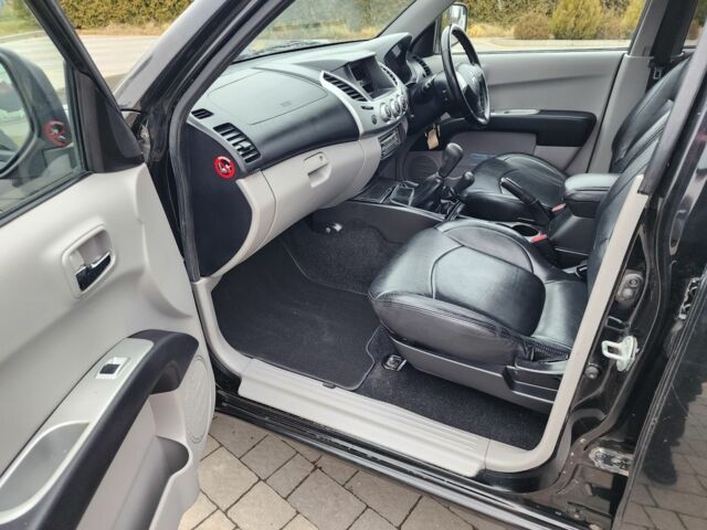 Черный Мицубиси Л 200, объемом двигателя 2.5 л и пробегом 114 тыс. км за 8748 $, фото 17 на Automoto.ua