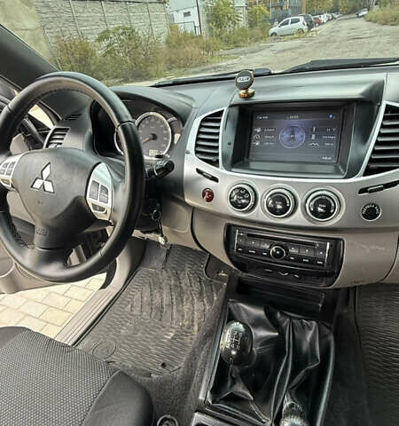 Міцубісі Л 200 2013 у Одесі на Automoto.ua Чорний Міцубісі Л 200, об'ємом двигуна 2.48 л та пробігом 94 тис. км за 14800 $, фото 12 на Automoto.ua