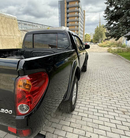 Міцубісі Л 200 2013 у Одесі на Automoto.ua Чорний Міцубісі Л 200, об'ємом двигуна 2.48 л та пробігом 94 тис. км за 14800 $, фото 6 на Automoto.ua