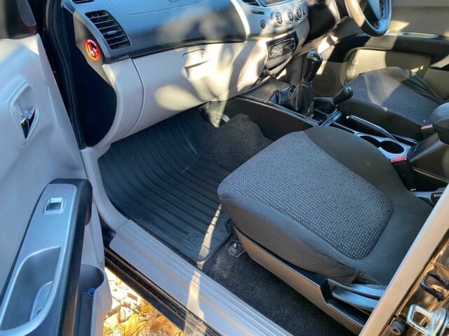 Черный Мицубиси Л 200, объемом двигателя 2.5 л и пробегом 163 тыс. км за 7600 $, фото 16 на Automoto.ua