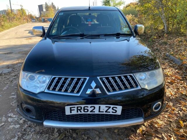 Черный Мицубиси Л 200, объемом двигателя 2.5 л и пробегом 163 тыс. км за 7600 $, фото 5 на Automoto.ua