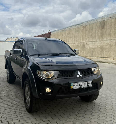 Міцубісі Л 200 2013 у Одесі на Automoto.ua Чорний Міцубісі Л 200, об'ємом двигуна 2.48 л та пробігом 94 тис. км за 14800 $, фото 18 на Automoto.ua