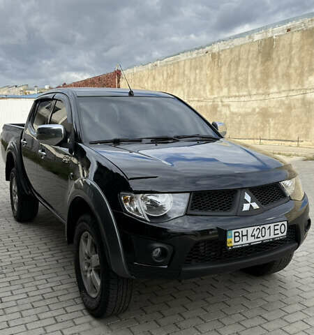 Міцубісі Л 200 2013 у Одесі на Automoto.ua Чорний Міцубісі Л 200, об'ємом двигуна 2.48 л та пробігом 94 тис. км за 14800 $, фото 1 на Automoto.ua