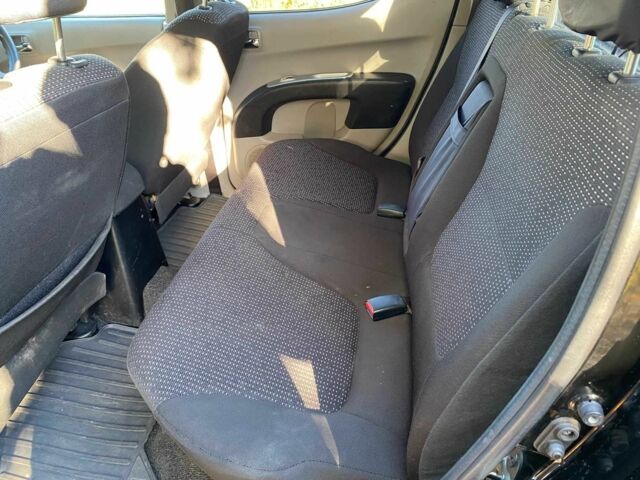 Черный Мицубиси Л 200, объемом двигателя 2.5 л и пробегом 163 тыс. км за 7600 $, фото 20 на Automoto.ua