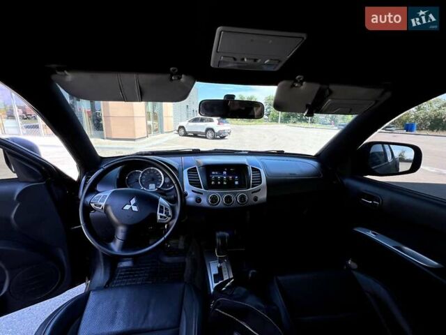 Чорний Міцубісі Л 200, об'ємом двигуна 2.48 л та пробігом 165 тис. км за 16300 $, фото 1 на Automoto.ua