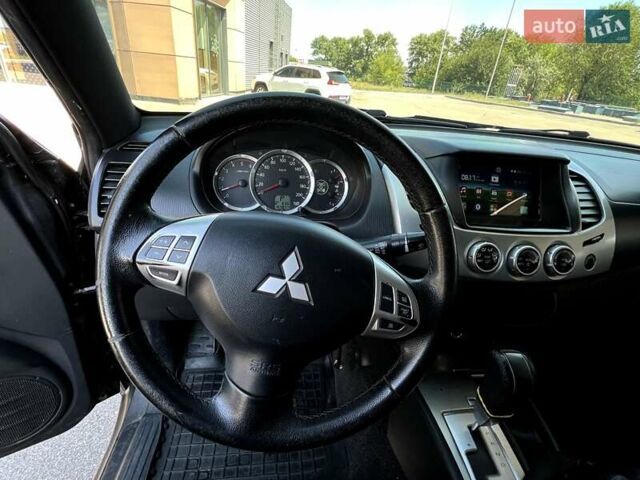 Чорний Міцубісі Л 200, об'ємом двигуна 2.48 л та пробігом 165 тис. км за 16300 $, фото 8 на Automoto.ua
