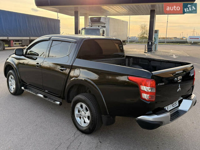 Чорний Міцубісі Л 200, об'ємом двигуна 2.44 л та пробігом 190 тис. км за 19900 $, фото 9 на Automoto.ua