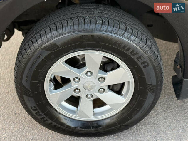 Чорний Міцубісі Л 200, об'ємом двигуна 2.44 л та пробігом 190 тис. км за 19900 $, фото 19 на Automoto.ua