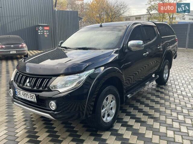Чорний Міцубісі Л 200, об'ємом двигуна 2.4 л та пробігом 205 тис. км за 20900 $, фото 2 на Automoto.ua