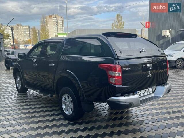 Чорний Міцубісі Л 200, об'ємом двигуна 2.4 л та пробігом 205 тис. км за 20900 $, фото 5 на Automoto.ua