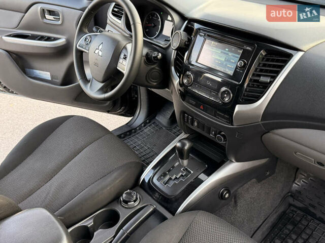 Чорний Міцубісі Л 200, об'ємом двигуна 2.44 л та пробігом 190 тис. км за 19900 $, фото 30 на Automoto.ua