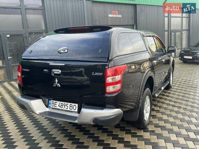 Чорний Міцубісі Л 200, об'ємом двигуна 2.4 л та пробігом 205 тис. км за 20900 $, фото 7 на Automoto.ua