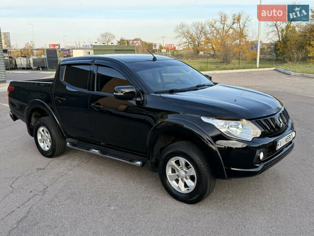 Чорний Міцубісі Л 200, об'ємом двигуна 2.44 л та пробігом 190 тис. км за 19900 $, фото 7 на Automoto.ua