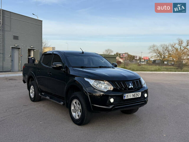Чорний Міцубісі Л 200, об'ємом двигуна 2.44 л та пробігом 190 тис. км за 19900 $, фото 2 на Automoto.ua