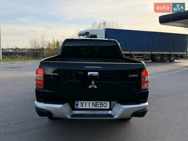 Чорний Міцубісі Л 200, об'ємом двигуна 2.44 л та пробігом 190 тис. км за 19900 $, фото 10 на Automoto.ua