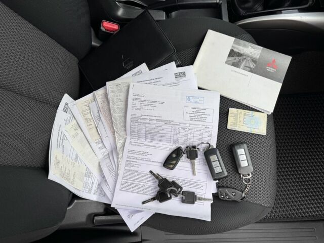 Черный Мицубиси Л 200, объемом двигателя 2.4 л и пробегом 186 тыс. км за 22200 $, фото 22 на Automoto.ua