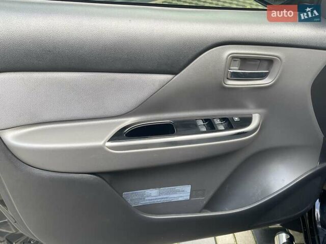 Чорний Міцубісі Л 200, об'ємом двигуна 2.4 л та пробігом 205 тис. км за 20900 $, фото 13 на Automoto.ua