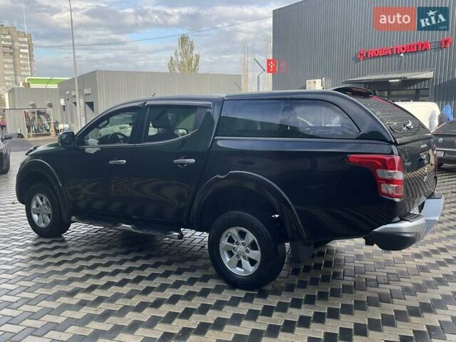 Чорний Міцубісі Л 200, об'ємом двигуна 2.4 л та пробігом 205 тис. км за 20900 $, фото 9 на Automoto.ua