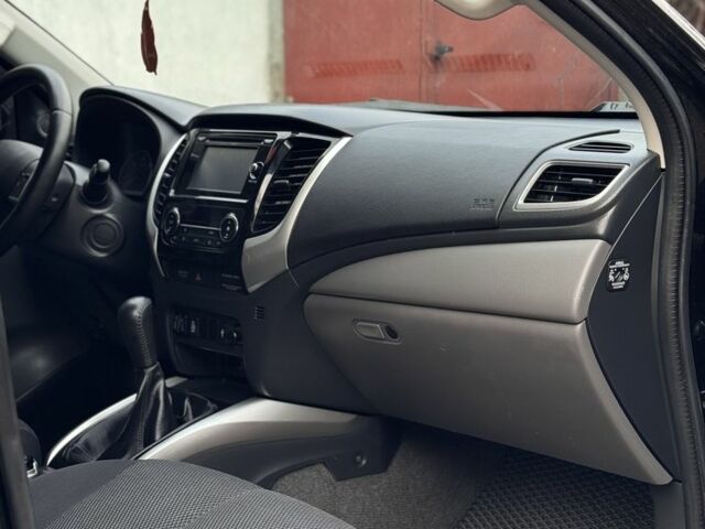 Черный Мицубиси Л 200, объемом двигателя 2.4 л и пробегом 186 тыс. км за 22200 $, фото 19 на Automoto.ua