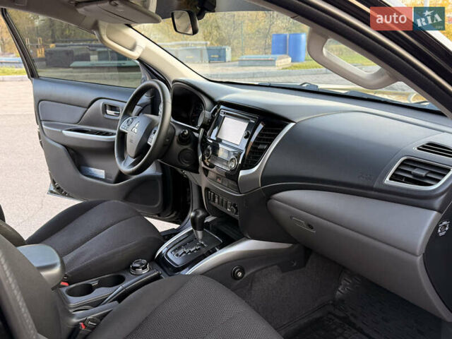 Чорний Міцубісі Л 200, об'ємом двигуна 2.44 л та пробігом 190 тис. км за 19900 $, фото 25 на Automoto.ua