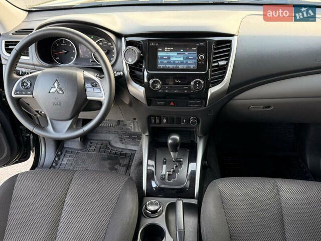 Чорний Міцубісі Л 200, об'ємом двигуна 2.44 л та пробігом 190 тис. км за 19900 $, фото 35 на Automoto.ua