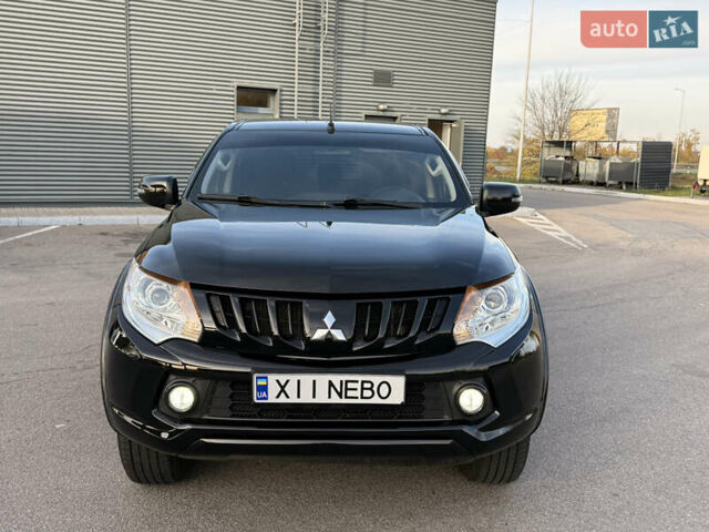 Чорний Міцубісі Л 200, об'ємом двигуна 2.44 л та пробігом 190 тис. км за 19900 $, фото 4 на Automoto.ua