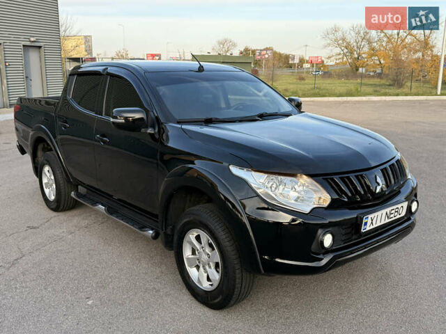 Чорний Міцубісі Л 200, об'ємом двигуна 2.44 л та пробігом 190 тис. км за 19900 $, фото 16 на Automoto.ua