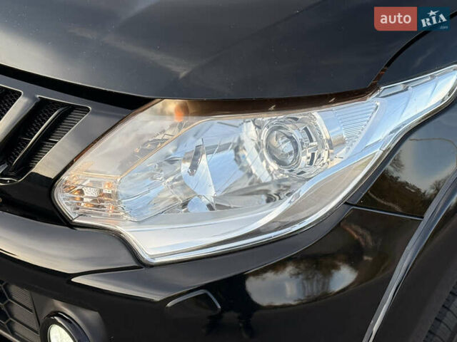 Чорний Міцубісі Л 200, об'ємом двигуна 2.44 л та пробігом 190 тис. км за 19900 $, фото 14 на Automoto.ua