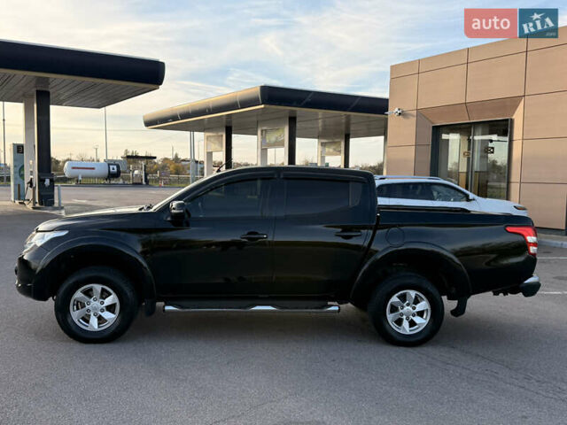 Чорний Міцубісі Л 200, об'ємом двигуна 2.44 л та пробігом 190 тис. км за 19900 $, фото 6 на Automoto.ua