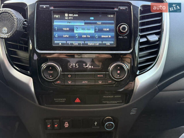 Чорний Міцубісі Л 200, об'ємом двигуна 2.44 л та пробігом 190 тис. км за 19900 $, фото 17 на Automoto.ua