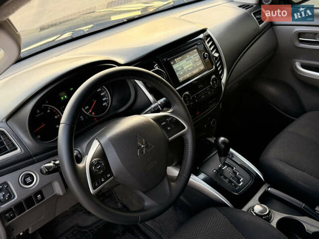 Чорний Міцубісі Л 200, об'ємом двигуна 2.44 л та пробігом 190 тис. км за 19900 $, фото 33 на Automoto.ua