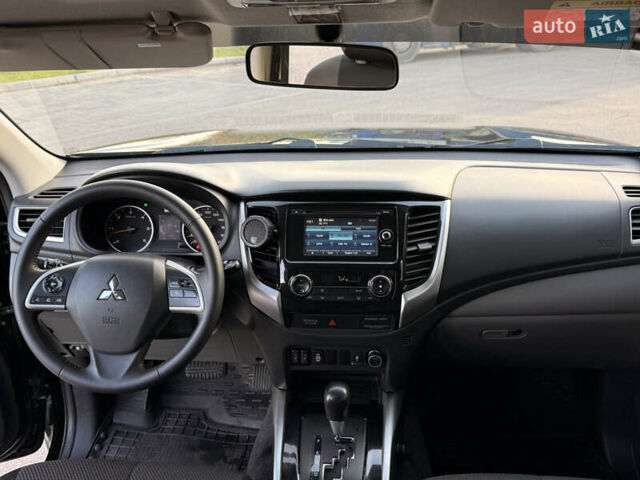 Чорний Міцубісі Л 200, об'ємом двигуна 2.44 л та пробігом 190 тис. км за 19900 $, фото 29 на Automoto.ua