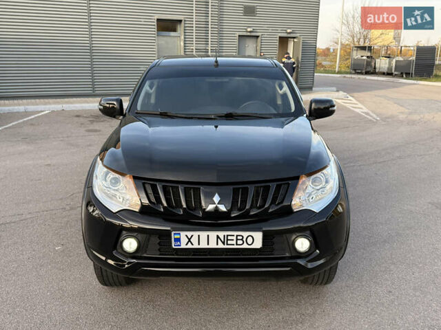 Чорний Міцубісі Л 200, об'ємом двигуна 2.44 л та пробігом 190 тис. км за 19900 $, фото 3 на Automoto.ua