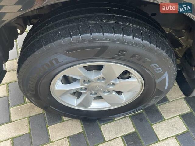 Чорний Міцубісі Л 200, об'ємом двигуна 2.4 л та пробігом 205 тис. км за 20900 $, фото 10 на Automoto.ua