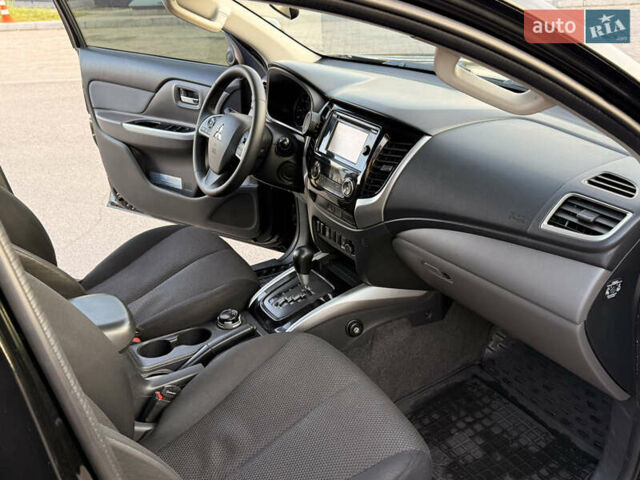 Чорний Міцубісі Л 200, об'ємом двигуна 2.44 л та пробігом 190 тис. км за 19900 $, фото 26 на Automoto.ua