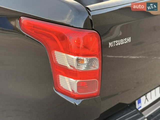 Чорний Міцубісі Л 200, об'ємом двигуна 2.44 л та пробігом 190 тис. км за 19900 $, фото 27 на Automoto.ua