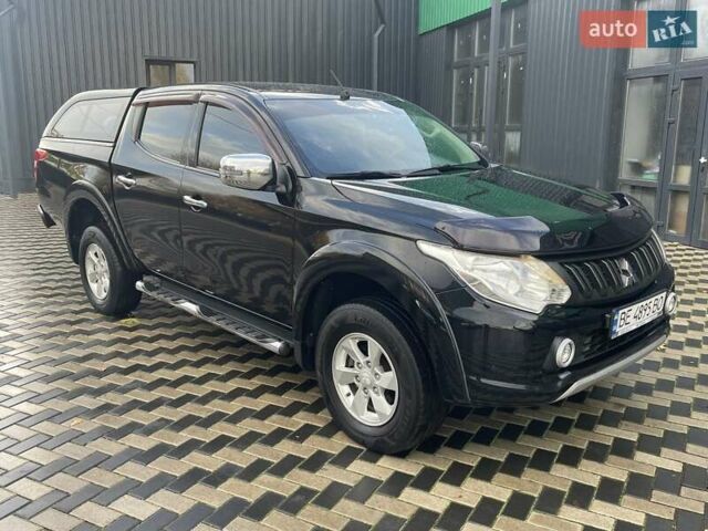 Чорний Міцубісі Л 200, об'ємом двигуна 2.4 л та пробігом 205 тис. км за 20900 $, фото 4 на Automoto.ua