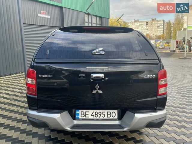 Чорний Міцубісі Л 200, об'ємом двигуна 2.4 л та пробігом 205 тис. км за 20900 $, фото 6 на Automoto.ua