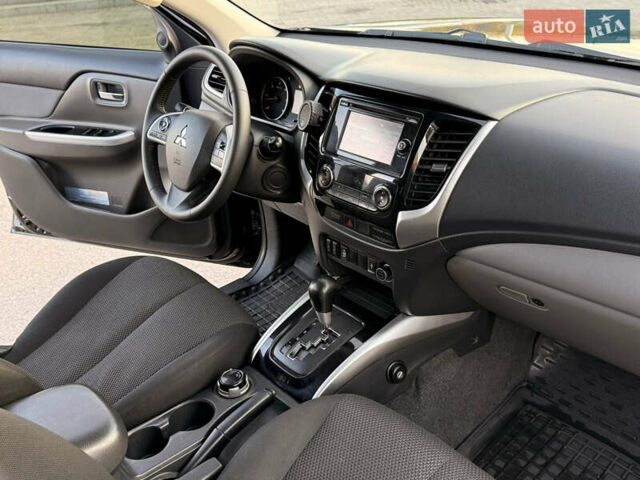 Чорний Міцубісі Л 200, об'ємом двигуна 2.44 л та пробігом 190 тис. км за 19900 $, фото 24 на Automoto.ua