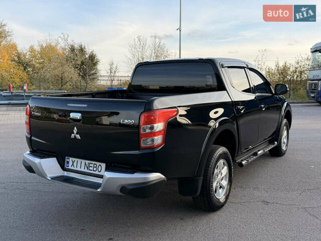 Чорний Міцубісі Л 200, об'ємом двигуна 2.44 л та пробігом 190 тис. км за 19900 $, фото 12 на Automoto.ua