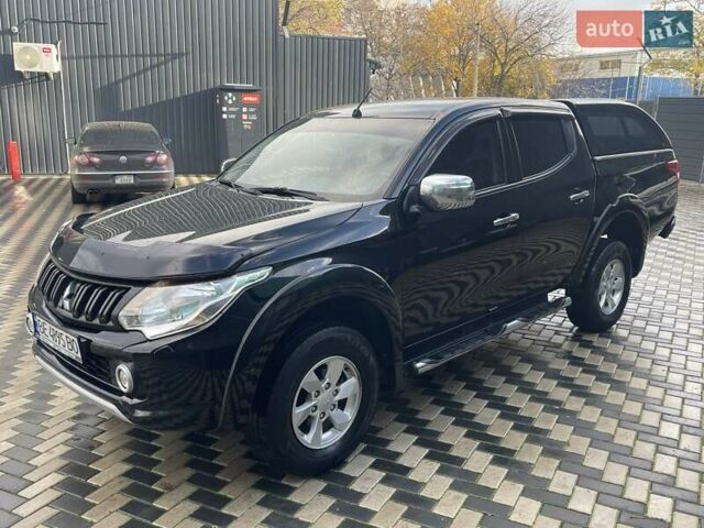 Чорний Міцубісі Л 200, об'ємом двигуна 2.4 л та пробігом 205 тис. км за 20900 $, фото 3 на Automoto.ua