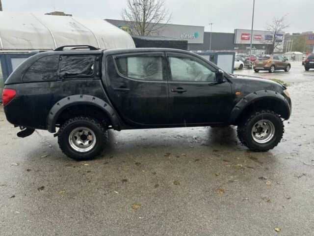 Чорний Міцубісі Л 200, об'ємом двигуна 2.5 л та пробігом 155 тис. км за 5481 $, фото 2 на Automoto.ua