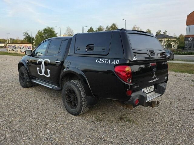 Черный Мицубиси Л 200, объемом двигателя 2.5 л и пробегом 182 тыс. км за 3800 $, фото 7 на Automoto.ua