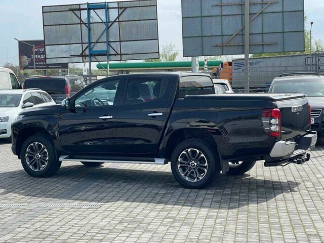 Черный Мицубиси Л 200, объемом двигателя 0 л и пробегом 58 тыс. км за 32900 $, фото 3 на Automoto.ua