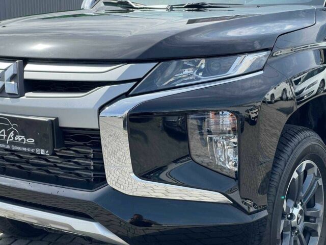 Черный Мицубиси Л 200, объемом двигателя 0 л и пробегом 58 тыс. км за 32900 $, фото 8 на Automoto.ua