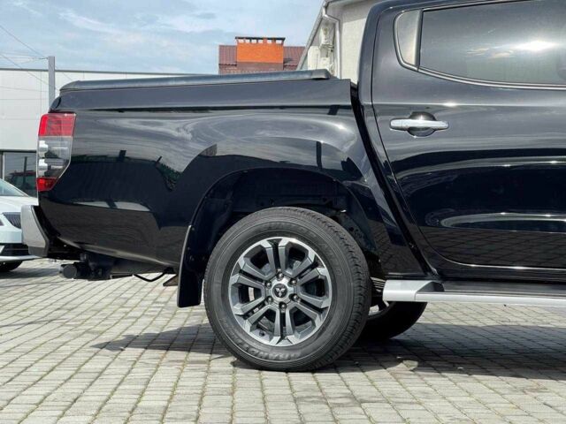 Черный Мицубиси Л 200, объемом двигателя 0 л и пробегом 58 тыс. км за 32900 $, фото 5 на Automoto.ua