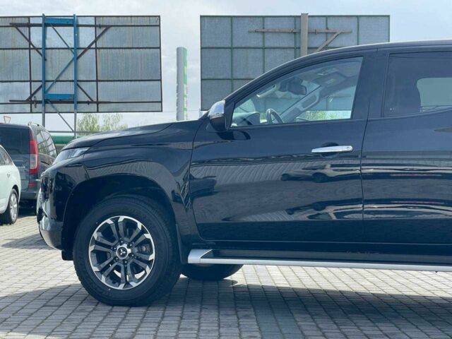 Черный Мицубиси Л 200, объемом двигателя 0 л и пробегом 58 тыс. км за 32900 $, фото 10 на Automoto.ua